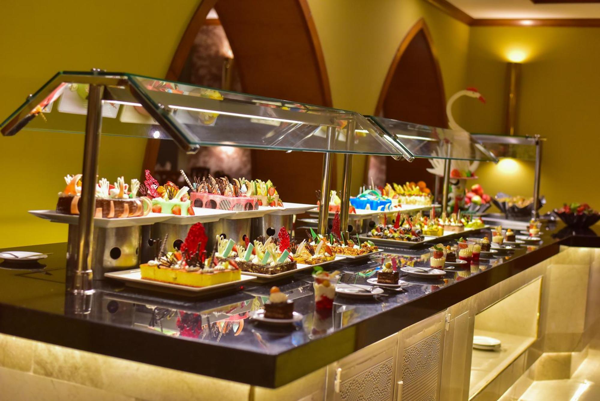 The Grand Hotel Sharm El Sheikh Экстерьер фото A dessert buffet