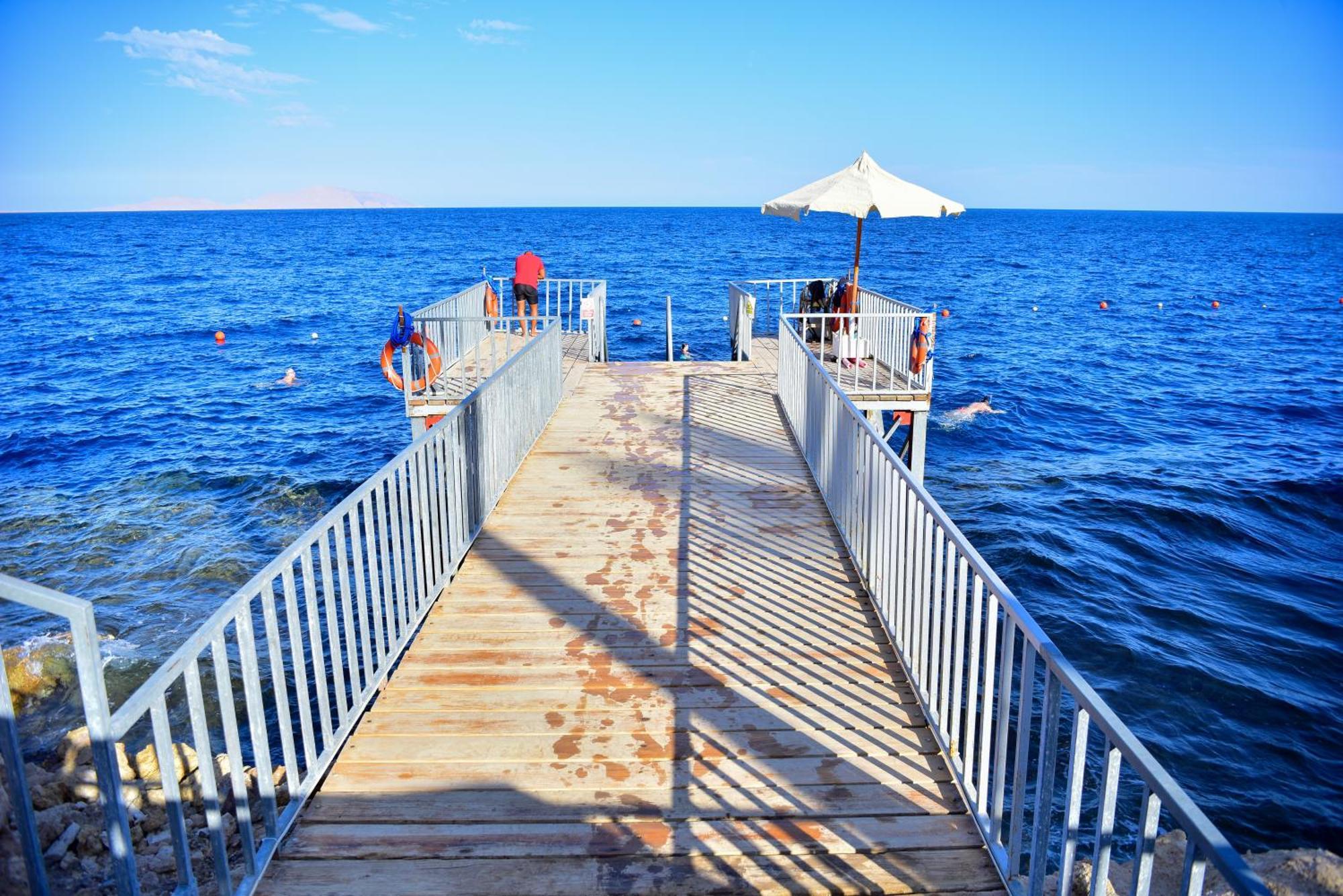 The Grand Hotel Sharm El Sheikh Экстерьер фото The pier at the beach of Agia Marina